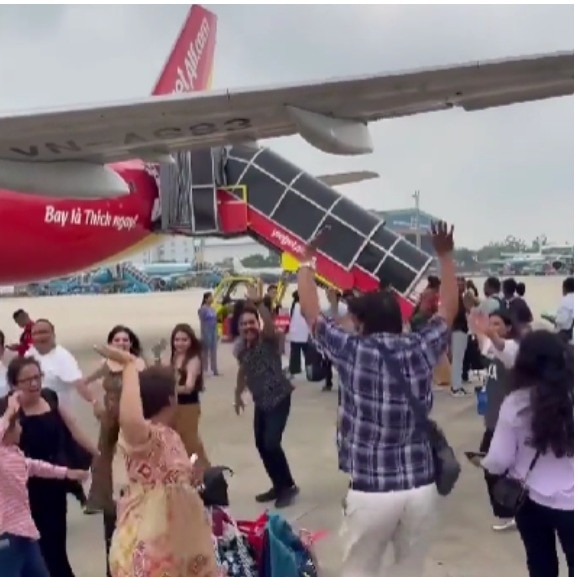 Indian tourists perform garba near aircraft at Vietnam airport. Video sparks outrage