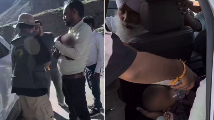 Infant collapses at Shinku La Pass in Ladakh, stranger’s quick action saves them (Photos: @ShivrattanDhil1/X) Infant collapses at Shinku La Pass in Ladakh, stranger’s quick action saves them