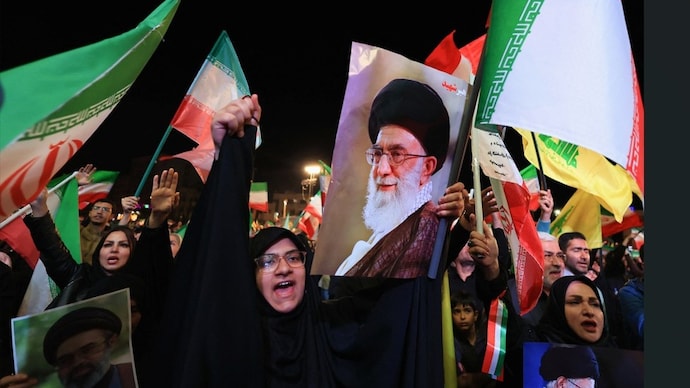 People take part in an anti-US and anti-Israel rally at Enghelab Square amid a ceasefire between US and Iran, in Tehran (Photo- Reuters)