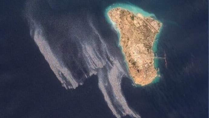 Satellite images show large dark patches near Iran’s Kharg Island oil terminal. (Image: X) iran running out of oil storage space capacity kharg island oil spill seen satellite images maritime marine life crisis