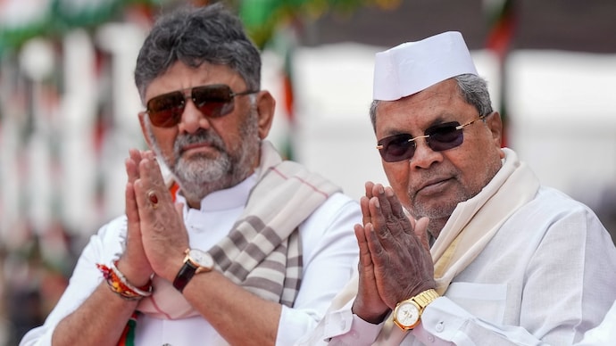 Karnataka Chief Minister Siddaramaiah (R) with Deputy CM DK Shivakumar at the 77th Republic Day Parade in Bengaluru. (Image: PTI) Karnataka Chief Minister Siddaramaiah (right) with Deputy CM DK Shivakumar at the 77th Republic Day Parade, in Bengaluru. (Image: PTI)