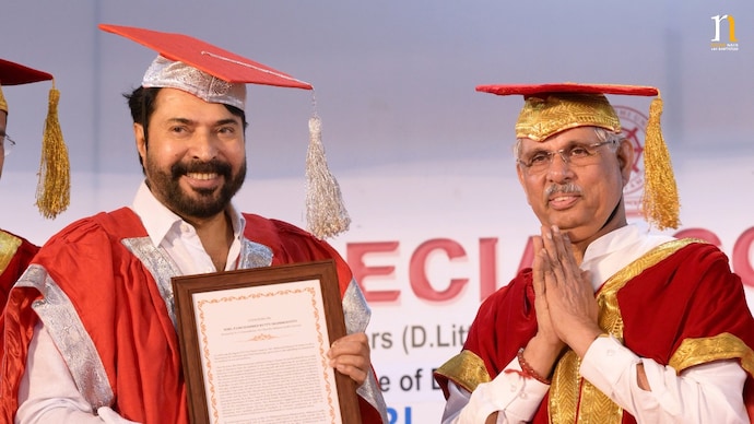Mammootty received his third honorary doctorate from Governor Rajendra Arlekar. (Photo credit: X/mammukka) Mammootty and Rajendra Arlekar