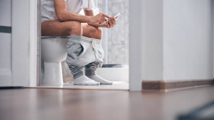 Constipated on a trip? Simple habits that can help you stay regular man using Bathroom: Photo: Getty