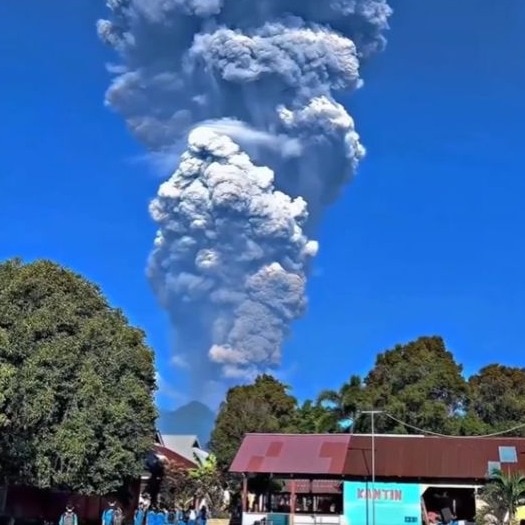 2 dead in Indonesia volcano eruption, found holding each other under debris