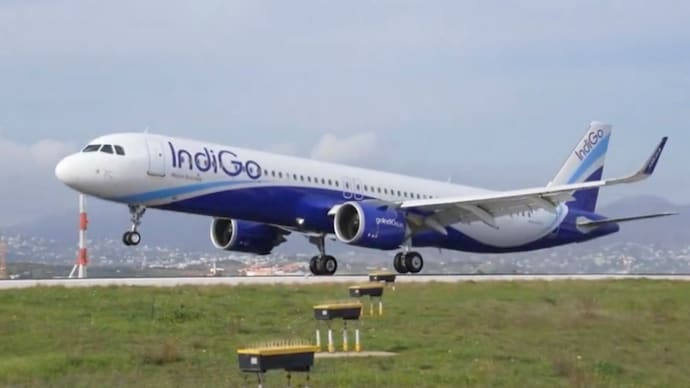 The flight reductions have come at a time when many families plan summer vacations and leisure travel. (Image: PTI) mumbai delhi bengaluru airport air india indigo express flight cuts reduction airfare hike air turbine fuel expensive summer vacation
