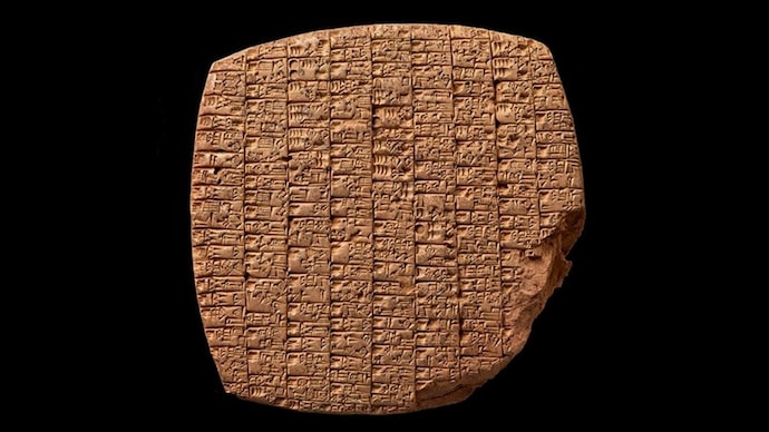 An image of an ancinet tablet with cuniform text on it. (Photo: Troels Pank Arboll) Oldest beer bill: 4,000-year-old tablet reveals bar magic spells, fear, bar receipt