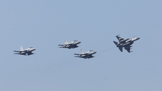 Pakistan Air Force's JF-17 Thunder jets fly past during the sea phase of Pakistan Navy's Multinational Exercise AMAN-23, in the North Arabian Sea near Karachi, Pakistan Pakistan Air Force's JF-17 Thunder jets fly past during the sea phase of Pakistan Navy's Multinational Exercise AMAN-23, in the North Arabian Sea near Karachi, Pakistan