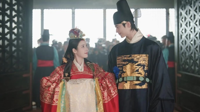 IU and Byeon Woo Seok in a still from Perfect Crown. perfect crown