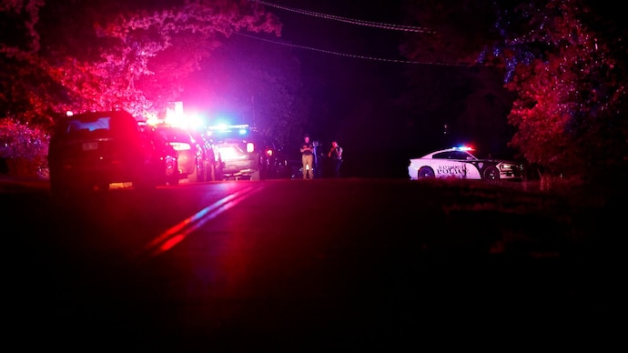 Police block off near S. Air Depot boulevard in Edmond, Okla., after a campground shooting at Lake Arcadia
