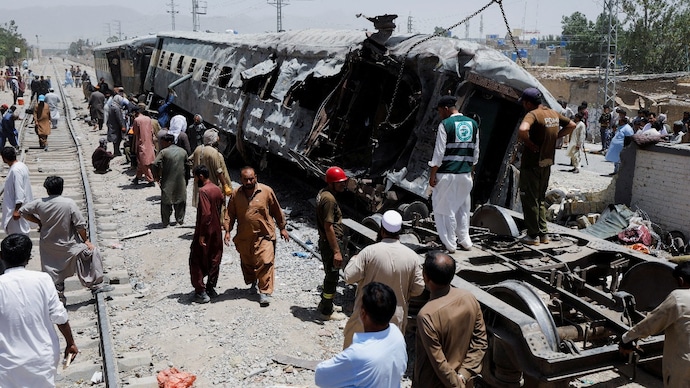 Railway staff work at the site, after a blast near a railway track in Quetta, Pakistan (Photo- Reuters)