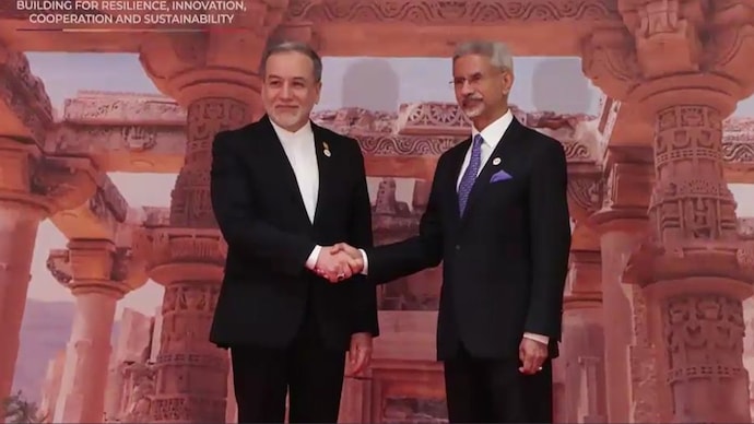 S Jaishankar welcomes Iran's Araghchi with handshake, short chat at Delhi BRICS event S Jaishankar welcomes Iran's Araghchi with handshake, short chat at Delhi BRICS event