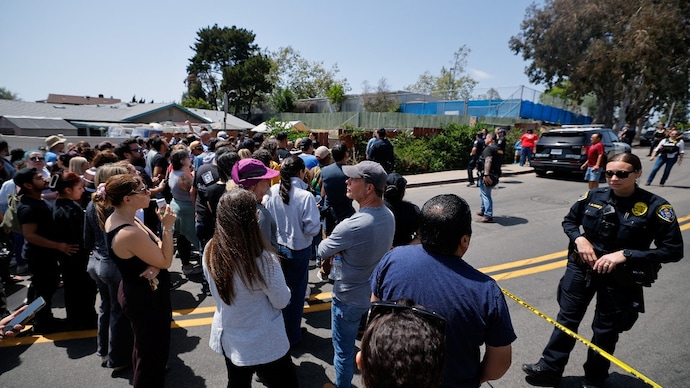 Three men, including a security guard, were killed after two teenage gunmen opened fire outside the Islamic Center of San Diego (Photo- Reuters)