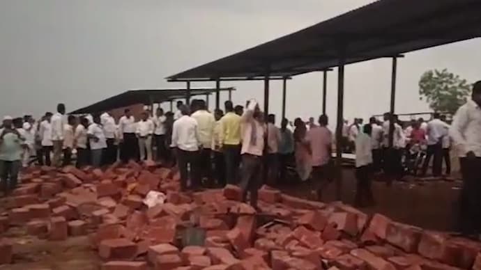 The devotees were taking shelter from strong winds and heavy rain near an under-construction wall when it collapsed. Sangli wall collapse
