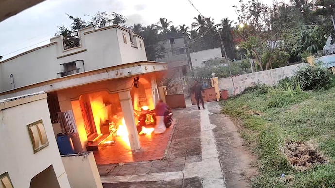 The accused thew lit kerosene-filled bottles at the woman’s house. (Photo: Screengrab/India Today) The accused thew lit kerosene-filled bottles at the woman’s house. (Photo: Screengrab/India Today)