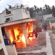 The accused thew lit kerosene-filled bottles at the woman’s house. (Photo: Screengrab/India Today) The accused thew lit kerosene-filled bottles at the woman’s house. (Photo: Screengrab/India Today)