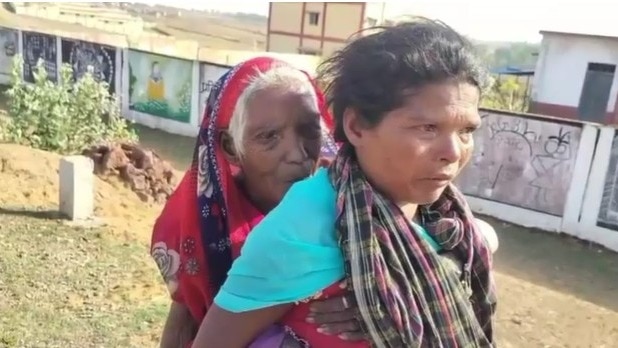 The viral video, reported from the Mainpat region in Surguja district, shows the woman carrying the elderly woman for nearly 9 kilometres through forest terrain so she could collect her pension from a bank.