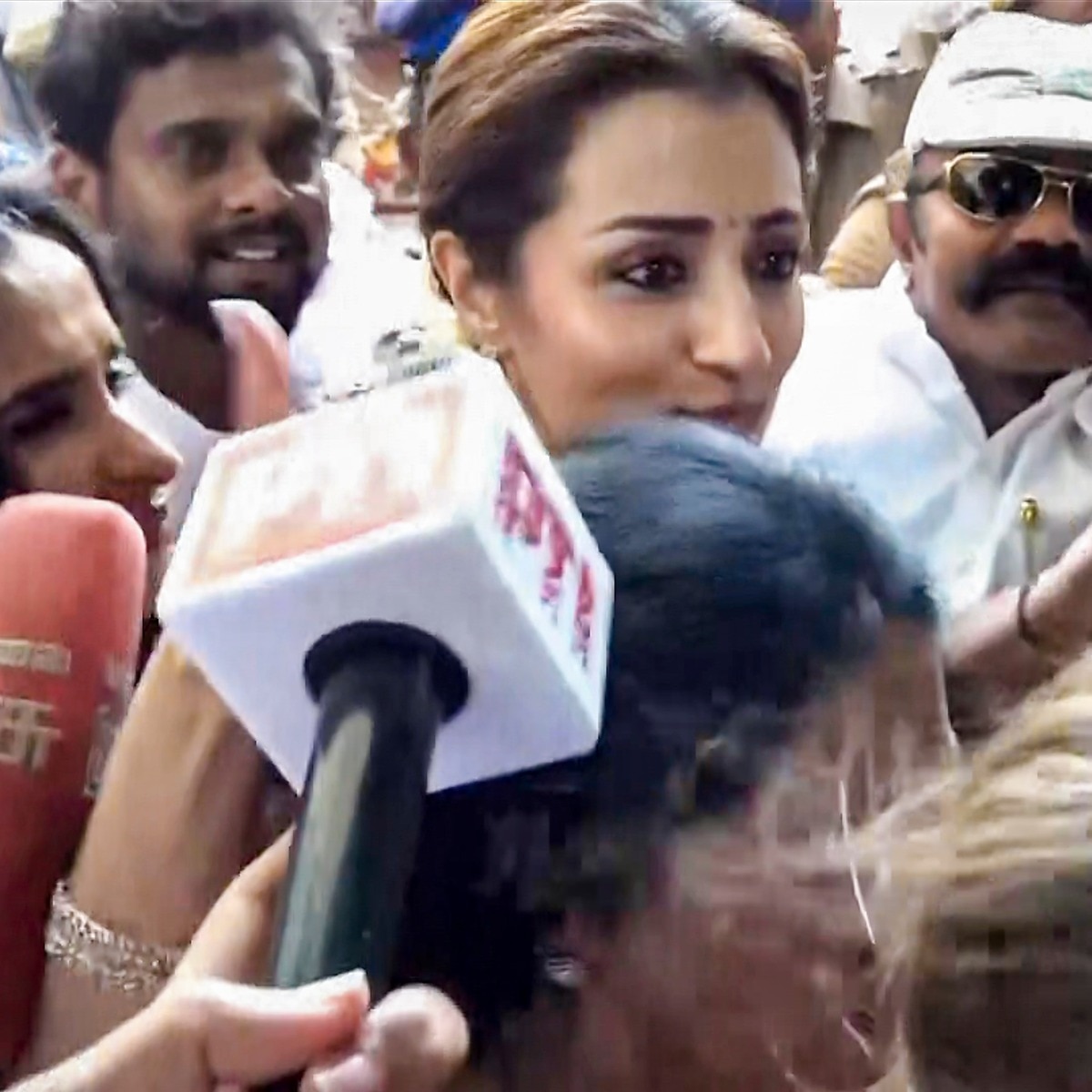 Actor Trisha mobbed after Vijay's swearing-in ceremony in Chennai. Watch