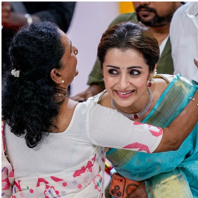 Trisha greets and hugs Vijay's mother Shoba at oath ceremony