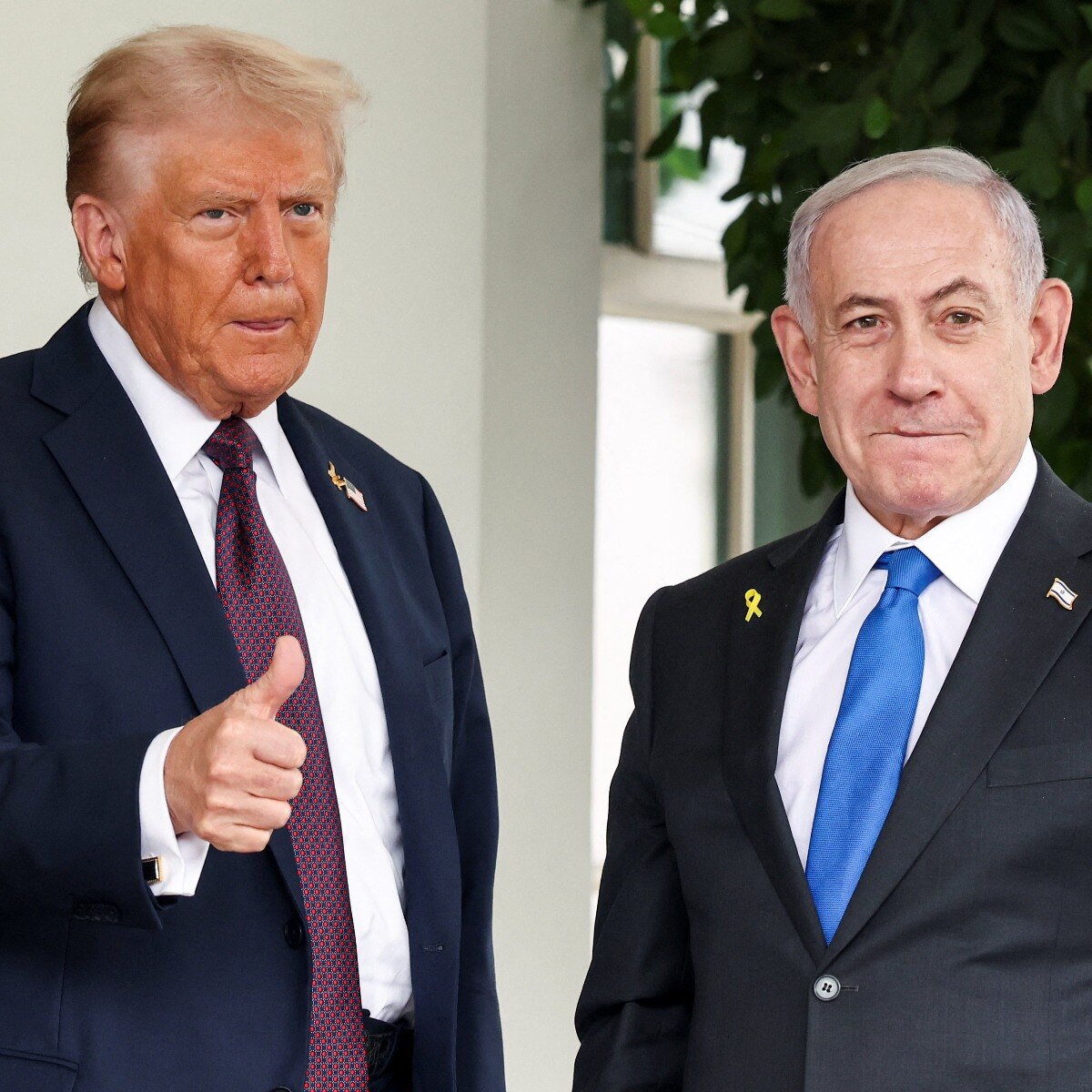 US President Donald Trump gives a thumbs up as he welcomes Israeli Prime Minister Benjamin Netanyahu at the White House in Washington, DC. (Photo: Reuters)