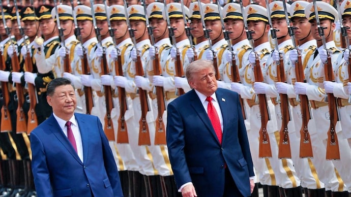 US President Donald Trump inspects an honour guard during a welcome ceremony with Chinese President Xi Jinping at the Great Hall of the People in Beijing. (Photo:" Reuters) Trump Xi Jinping