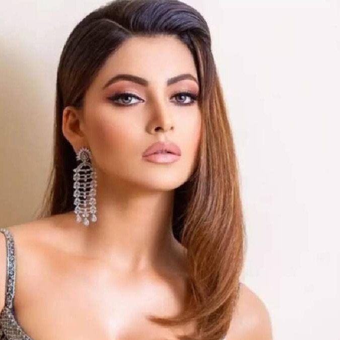 Urvashi Rautela reacts as viral AI pic shows her touching Deepika, Aishwarya's feet