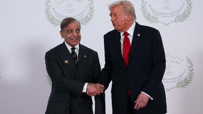 US President Donald Trump and Pakistani Prime Minister Shehbaz Sharif shake hands as they pose for a photo, at a world leaders' summit on ending the Gaza war, amid a US-brokered prisoner-hostage swap and ceasefire deal between Israel and Hamas. (Reuters) US President Donald Trump and Pakistani Prime Minister Shehbaz Sharif shake hands as they pose for a photo, at a world leaders' summit on ending the Gaza war, amid a US-brokered prisoner-hostage swap and ceasefire deal between Israel and Hamas. (Reuters)