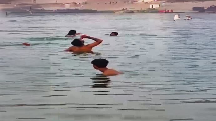 Screengrab) varanasi ganga beer party police action hindu sentiment hurt