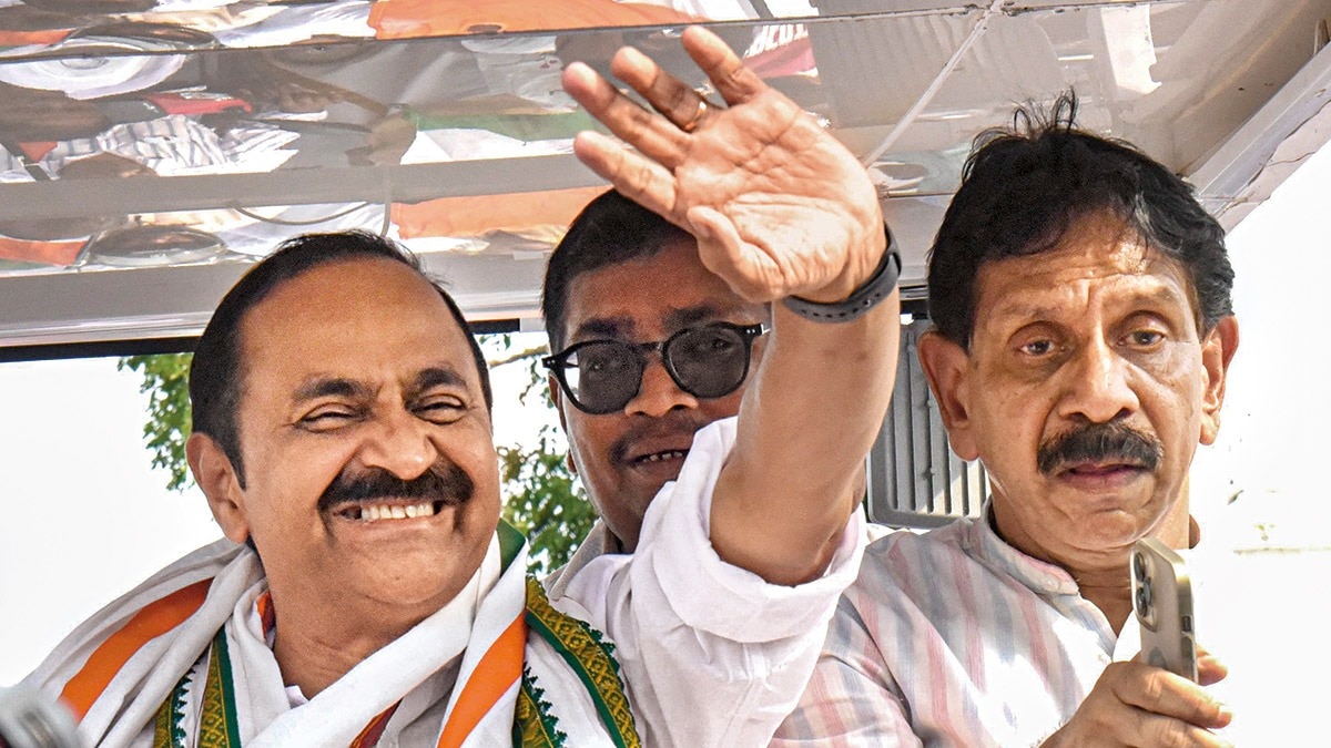 WAVE FOR A WIN: V.D. Satheesan in Paravur after winning the seat in the assembly polls, May 6. (Photo: PTI)