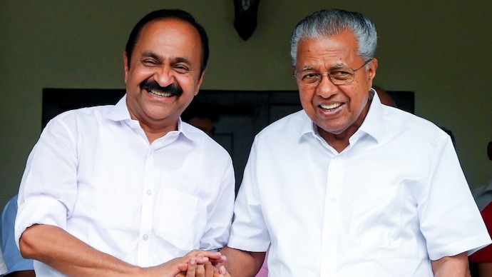 Congress leader VD Satheesan (left) met the CPI(M)'s Pinarayi Vijayan after he was named the next Kerala CM by the party. (Image: PTI) VD Sathessan Pinarayi Vijayan