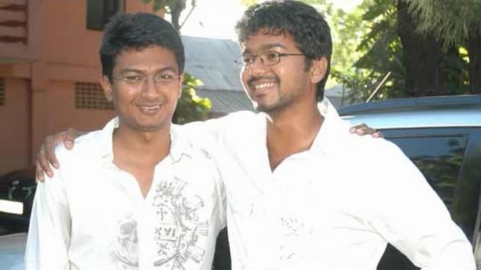 Vijay (right) with Udhayanidhi Stalin in an old photograph. Old picture of Vijay and Udhayanidhi goes viral as they face off for assembly