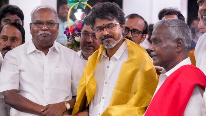 TVK chief Vijay being welcomed by CPI(M) Tamil Nadu state secretary P Shanmugam and senior party leaders Vijay Tamil Nadu