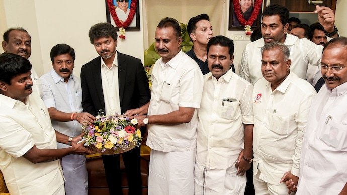 Tamil Nadu Chief Minister C Joseph Vijay with AIDMK leaders CV Shanmugam, SP Velumani and others Vijay TVK