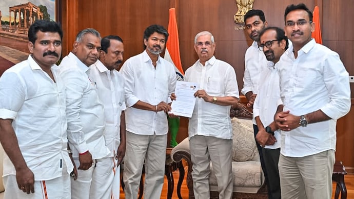 Vijay with Tamil Nadu Governor Rajendra Vishwanath Arlekar Vijay with Tamil Nadu Governor
