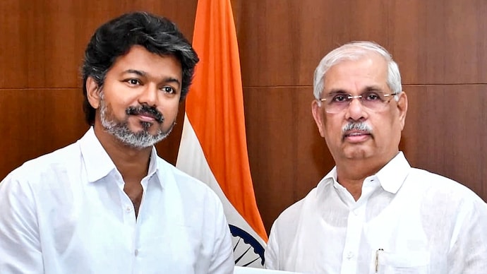 Tamil Nadu Governor Rajendra Arlekar with Tamilaga Vettri Kazhagam (TVK) chief Vijay at Lok Bhavan in Chennai. (Photo: PTI)