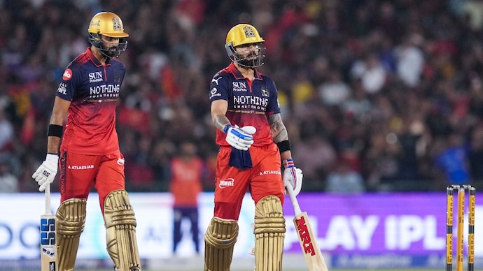 Kohli and Padikkal setup the chase against KKR perfectly (Courtesy: PTI) Virat Kohli, Devdutt Padikkal