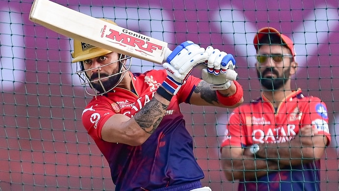 Dinesh Karthik said Virat Kohli urged him to take batting coach role at RCB(PTI Photo) Virat Kohli