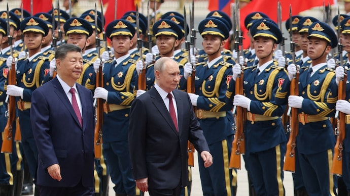 Russian President Vladimir Putin and Chinese President Xi Jinping inspect guard of honour during a welcoming ceremony at the Great Hall of the People in Beijing on May 20, 2026. (Photo: Reuters) Vladimir Putin in China