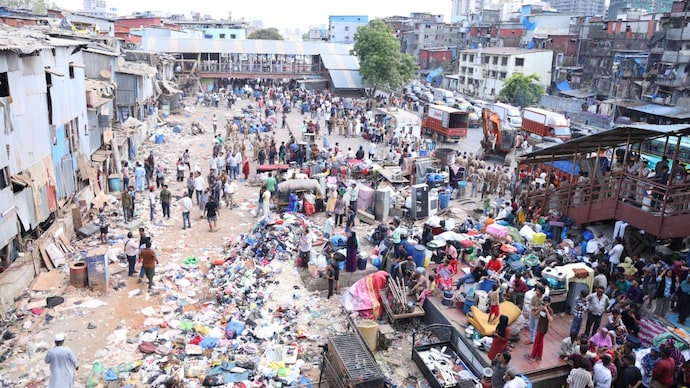 The eviction drive in Mumbai's Bandra East suburb is removing over 400 unauthorised structures spread across roughly 500 metres near the railway tracks. (Image: Western Railway) western railway eviction drive bandra east mumbai bkc transit hub transport news bullet train mumbai local train why slums demolished