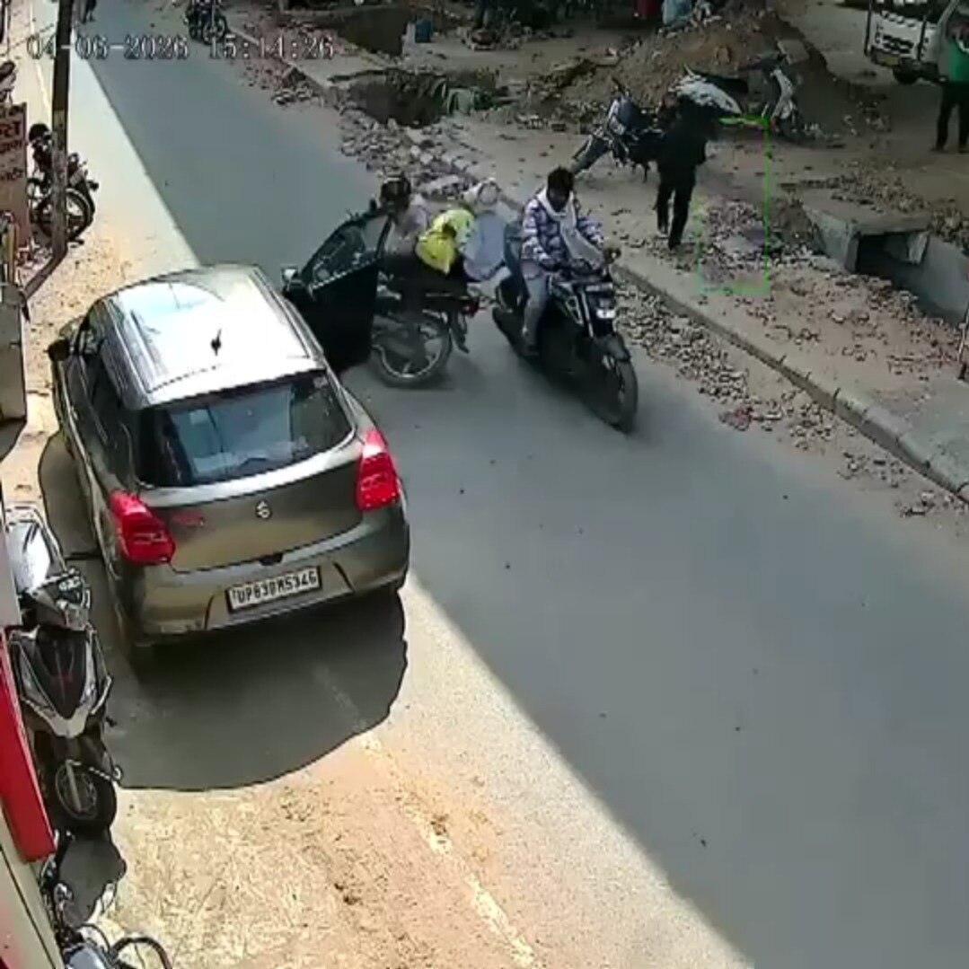 Video: Parked car door opens suddenly, biker crashes into it; 2 dead