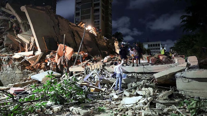 A collapsed building in Caracas after Venezuela's strongest earthquakes in 125 years, hours before a quake struck Japan. A collapsed building in Caracas after Venezuela's strongest earthquakes in 125 years, hours before a quake struck Japan.