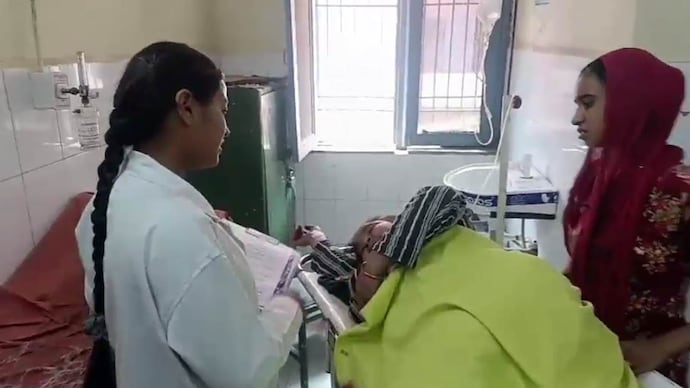 Two masked men on a motorcycle shot a woman in the leg near in Aligarh Aligarh