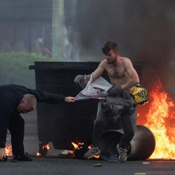 He's trying to cut off his head: Belfast burns after refugee tries to behead local