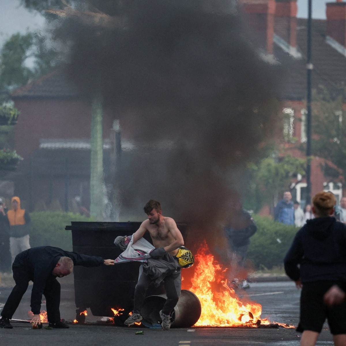 Bus torched, streets erupt as Belfast stabbing fuels migrant backlash