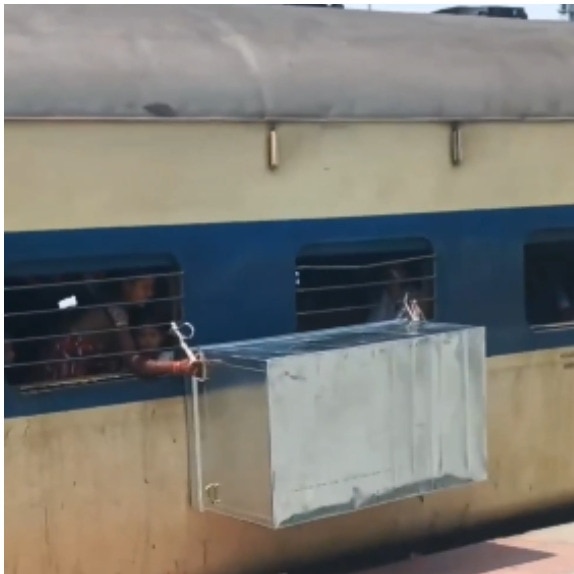 Bihar passengers haul giant metal trunk through train window, Railways reacts