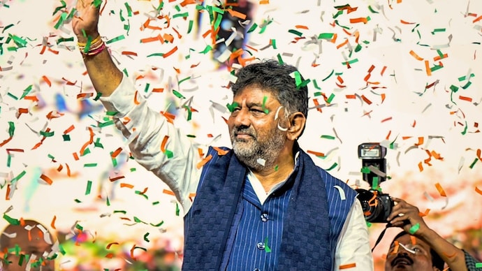Shivakumar took oath as the 25th Chief Minister of Karnataka at a low-key ceremony held at Lok Bhavan on Wednesday. (Image: PTI) Doddahalli Kempegowda Shivakumar takes charge as the Chief Minister of Karnataka after a hectic posturing for at least three years. (Image: PTI)