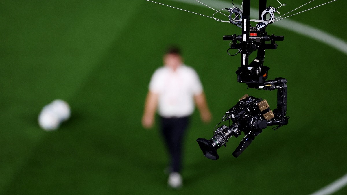Camera comes crashing down in football match, crew