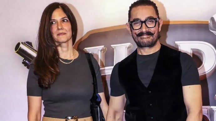 Aamir Khan (R) confirms intimate home ceremony with Gauri Spratt (L). Aamir Khan (R) confirms intimate home ceremony with Gauri Spratt (L)