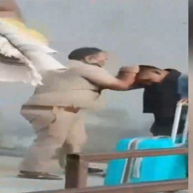 Video: Railway cop beats passenger, drags him by hair at Surat station