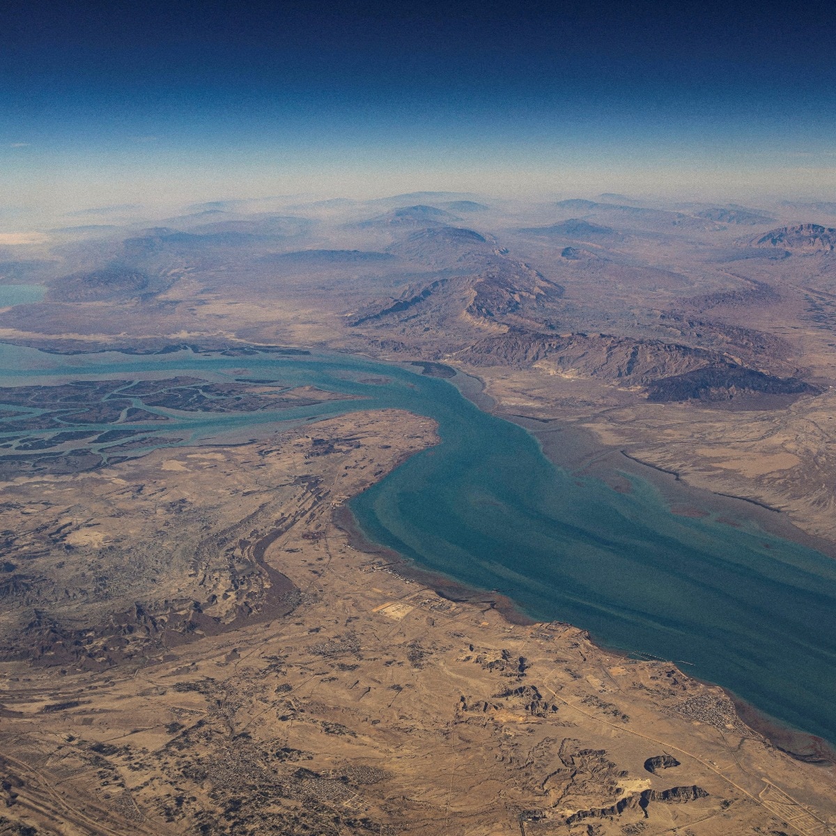 Explosions heard near Iran's Qeshm Island, according to reports