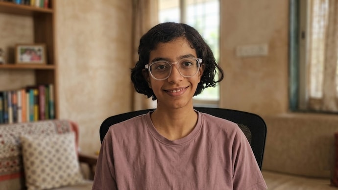 JEE Advanced 2026 female topper Arohi Deshpande secured AIR 77 after moving from Pune to Kota for preparation. (AI-edited image) JEE Advanced 2026 girl topper Aarohi Deshpande shares success tips